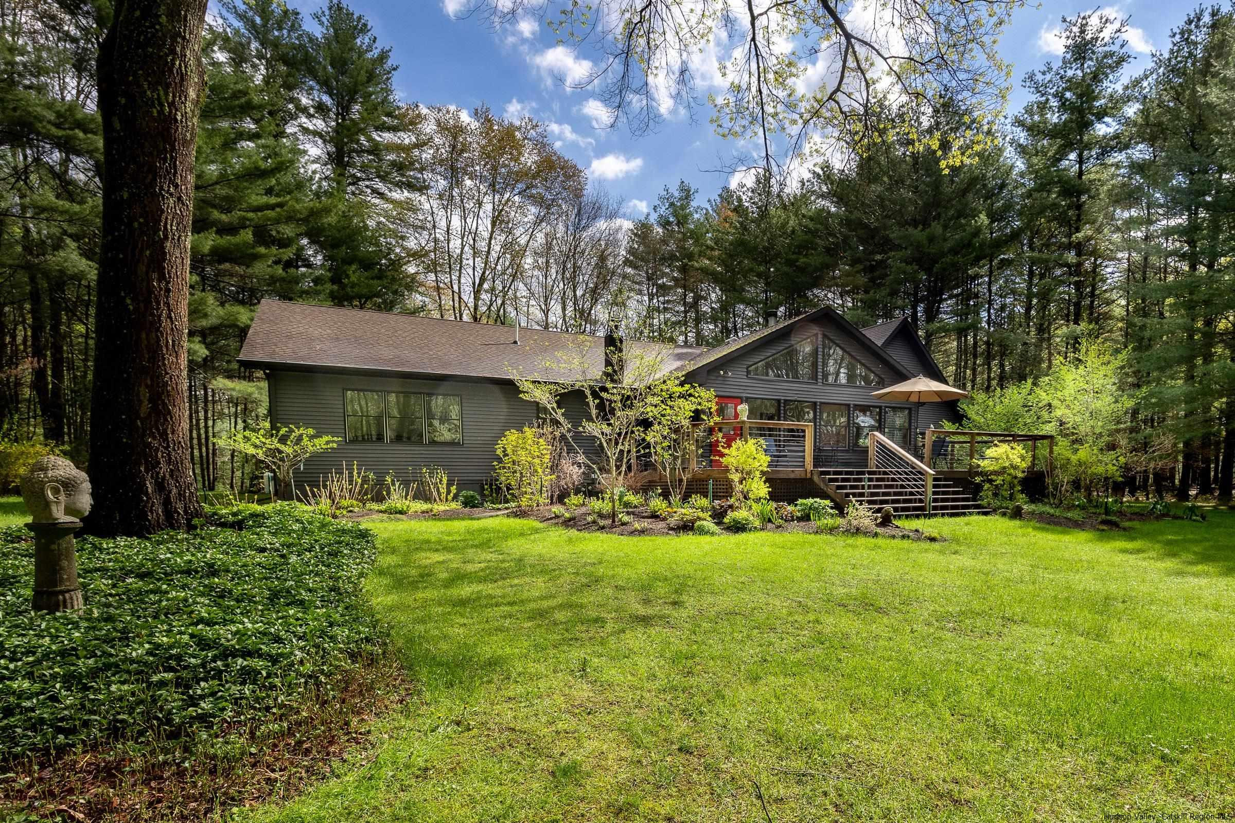 279 Scarawan Road Stone Ridge, NY 12484 - Photo 2 of 23 a front view of a house with a yard