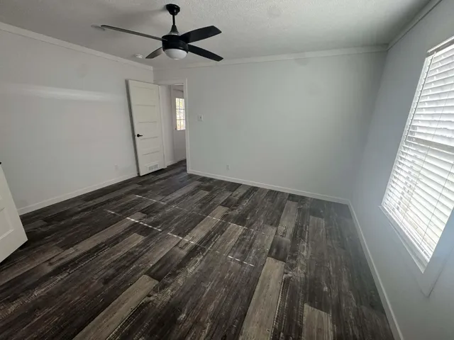 a view of a room with racks on the wall