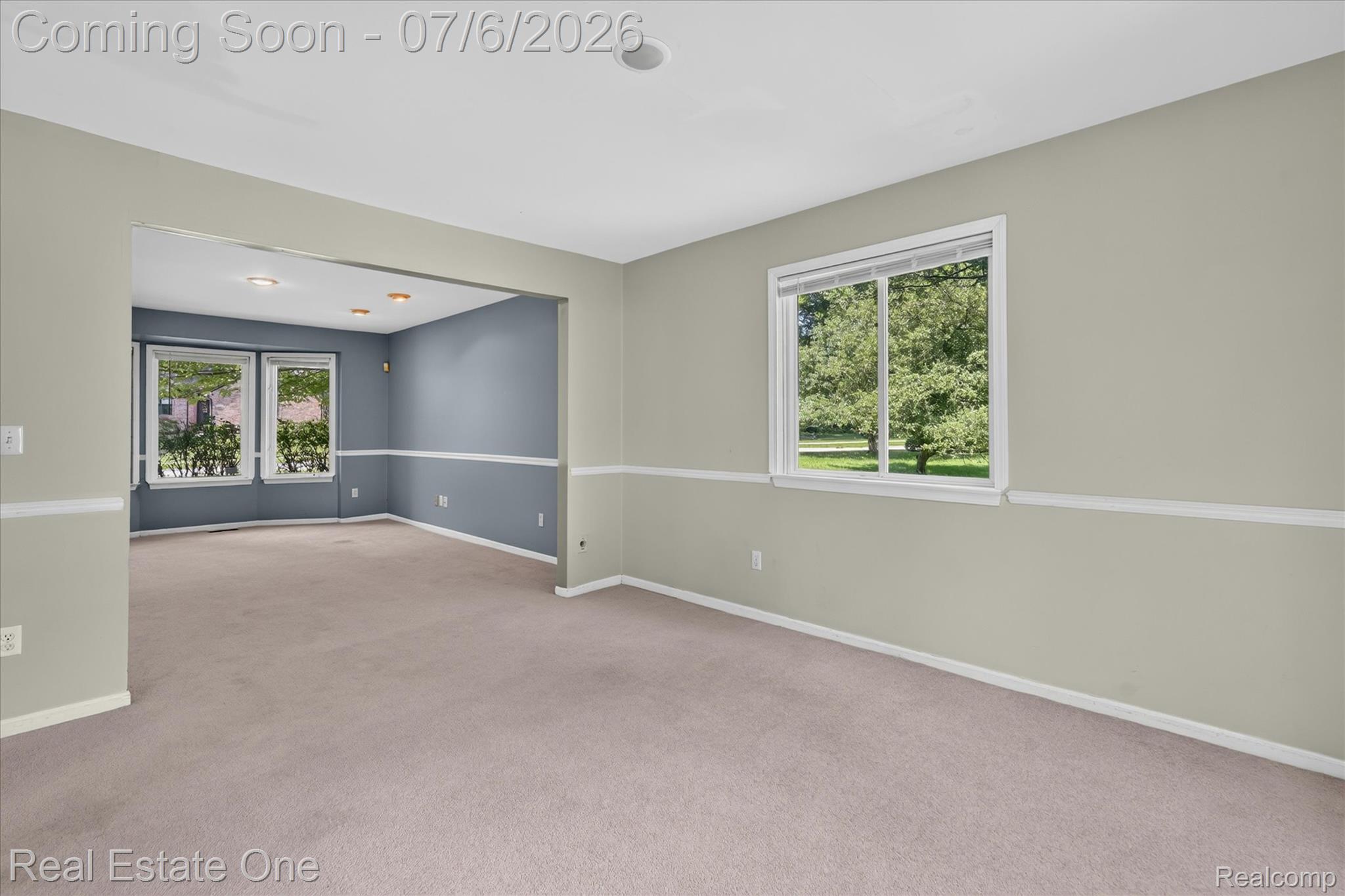 9610 Forest Ridge Drive Clarkston, MI 48348 - Photo 11 of 77 Flowing seamlessly from the formal living room, the spacious 10'6" x 13'5" dining room is ideal for both everyday meals and special occasions. Soft, neutral tones create a timeless backdrop that complements any dining room furniture. Windows on the side and rear walls fill the room with natural light while offering lovely views of the backyard. Convenient access to the kitchen makes entertaining effortless, creating a functional and elegant space for gathering with family and friends.
