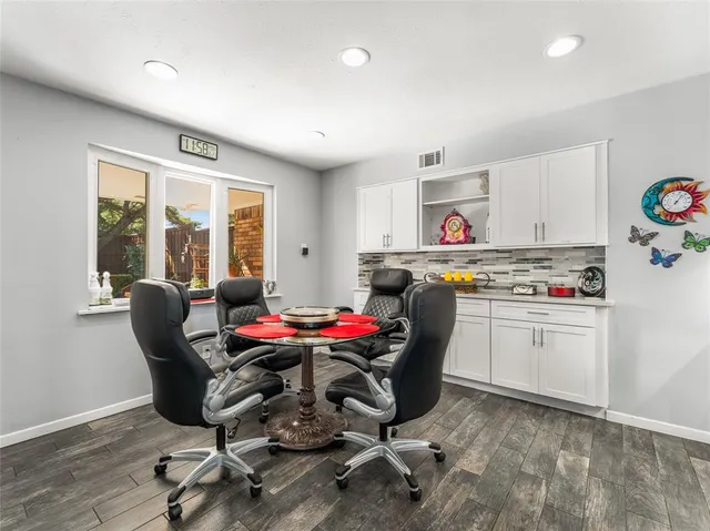 a work place with furniture and window