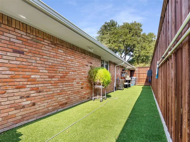 a view of a backyard with a garden
