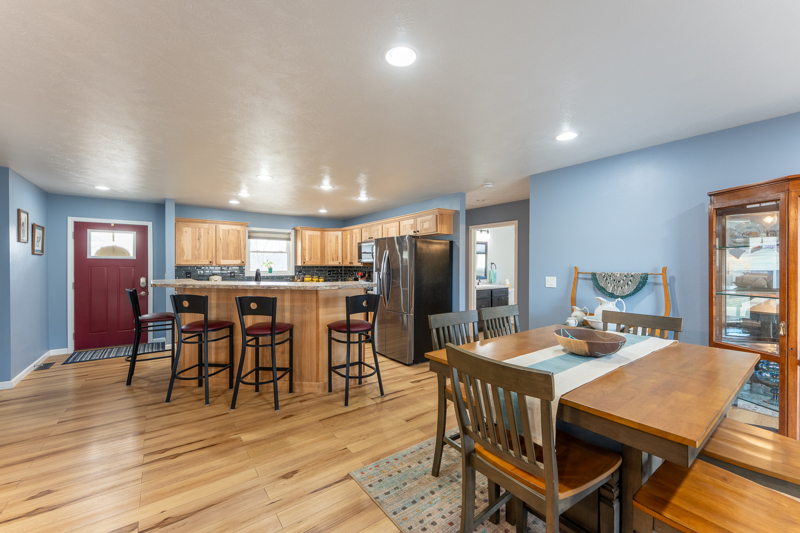 125 Old Bloomfield Road Vienna, IL 62995 - Photo 13 of 53 a dining room with furniture and wooden floor