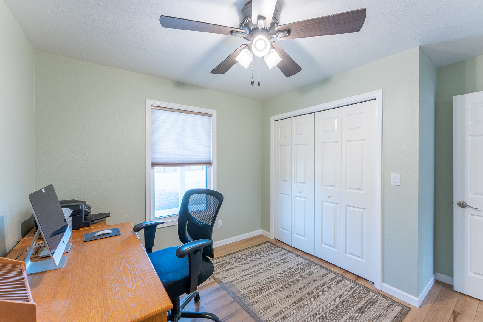 125 Old Bloomfield Road Vienna, IL 62995 - Photo 28 of 53 a view of a workspace with furniture and a window