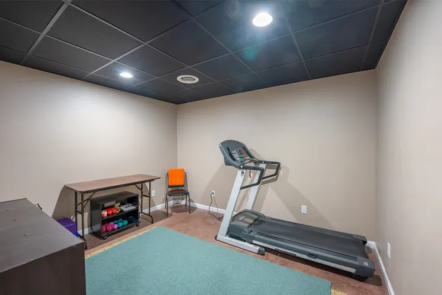 a view of a room with gym equipment