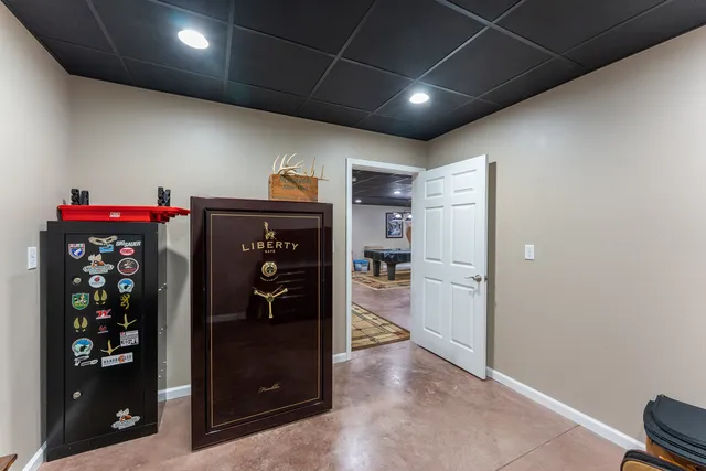 a room with furniture and pool table