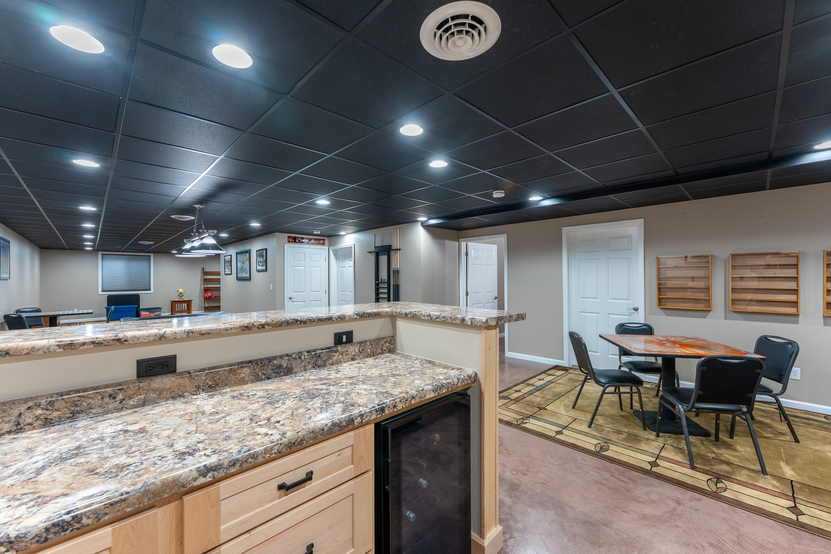 125 Old Bloomfield Road Vienna, IL 62995 - Photo 42 of 53 a kitchen with stainless steel appliances granite countertop a sink and a counter top space