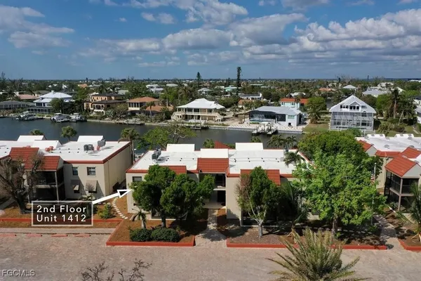 an aerial view of a house with sitting space