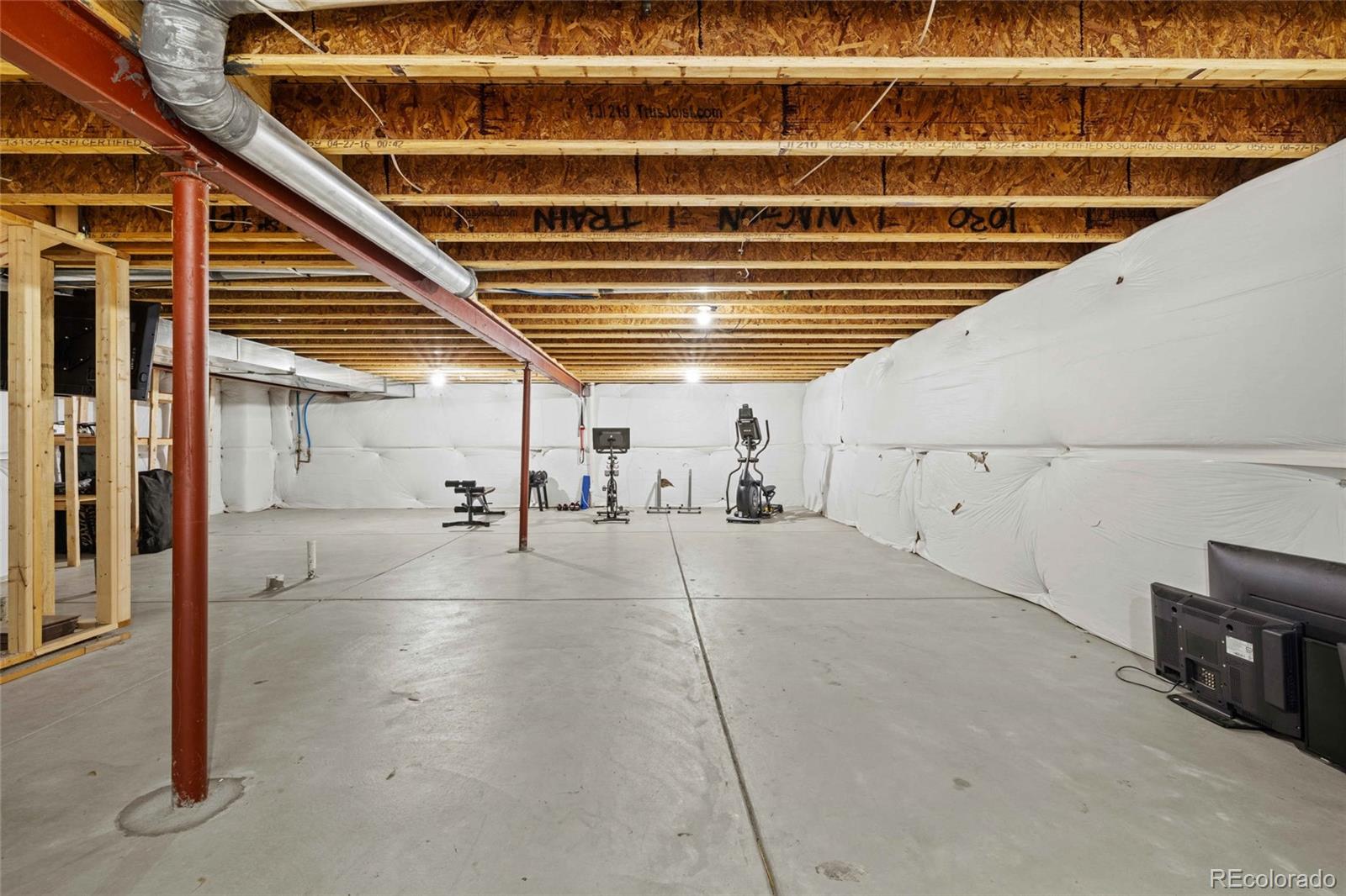 1030 Wagon Train Drive Milliken, CO 80543 - Photo 32 of 49 a view of a garage