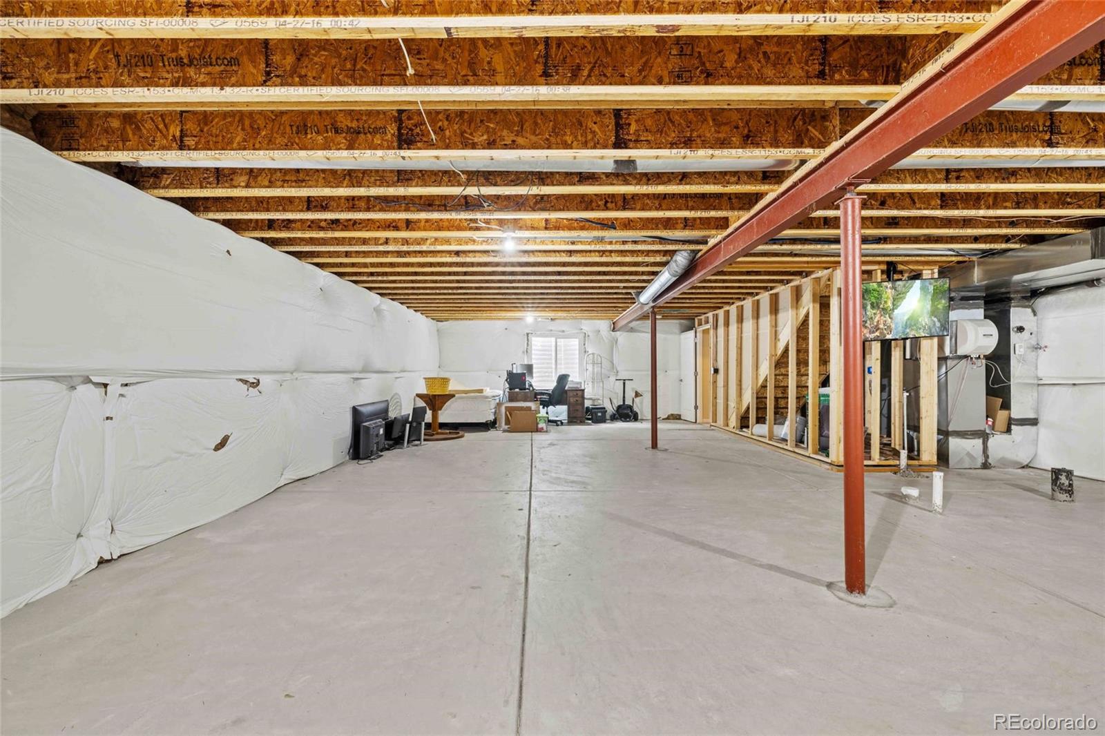 1030 Wagon Train Drive Milliken, CO 80543 - Photo 33 of 49 a view of storage and utility room