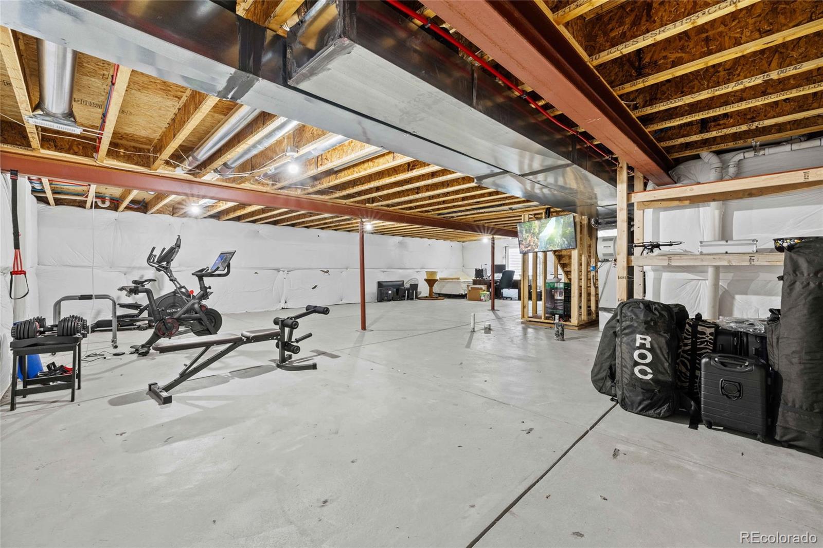 1030 Wagon Train Drive Milliken, CO 80543 - Photo 34 of 49 a view of gym