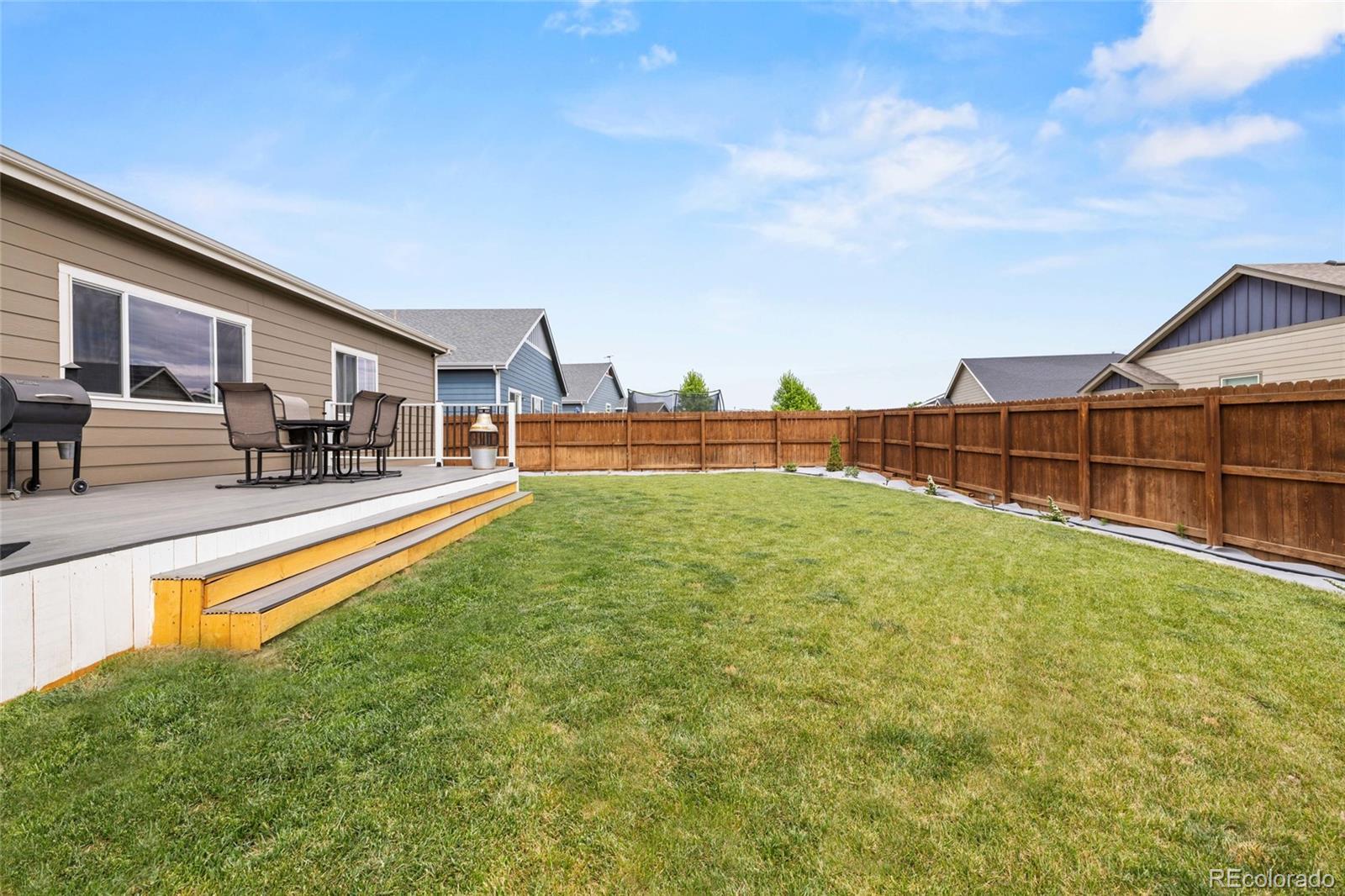 1030 Wagon Train Drive Milliken, CO 80543 - Photo 40 of 49 a view of swimming pool with seating area