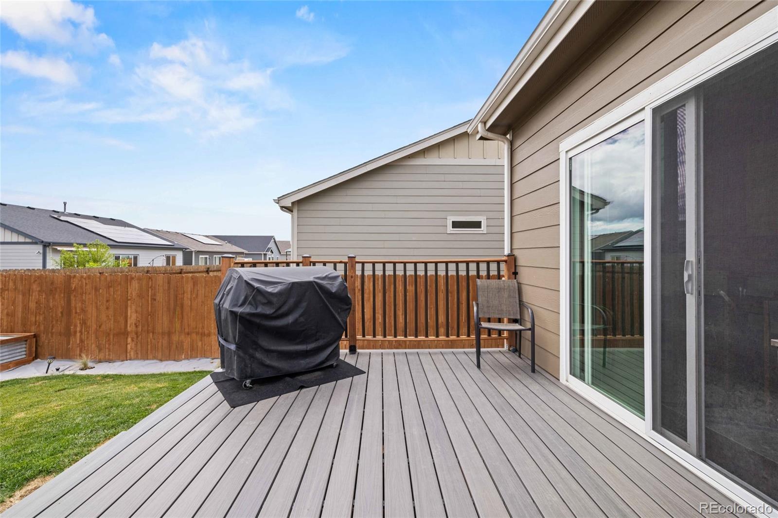 1030 Wagon Train Drive Milliken, CO 80543 - Photo 44 of 49 a view of a two chairs on the roof deck