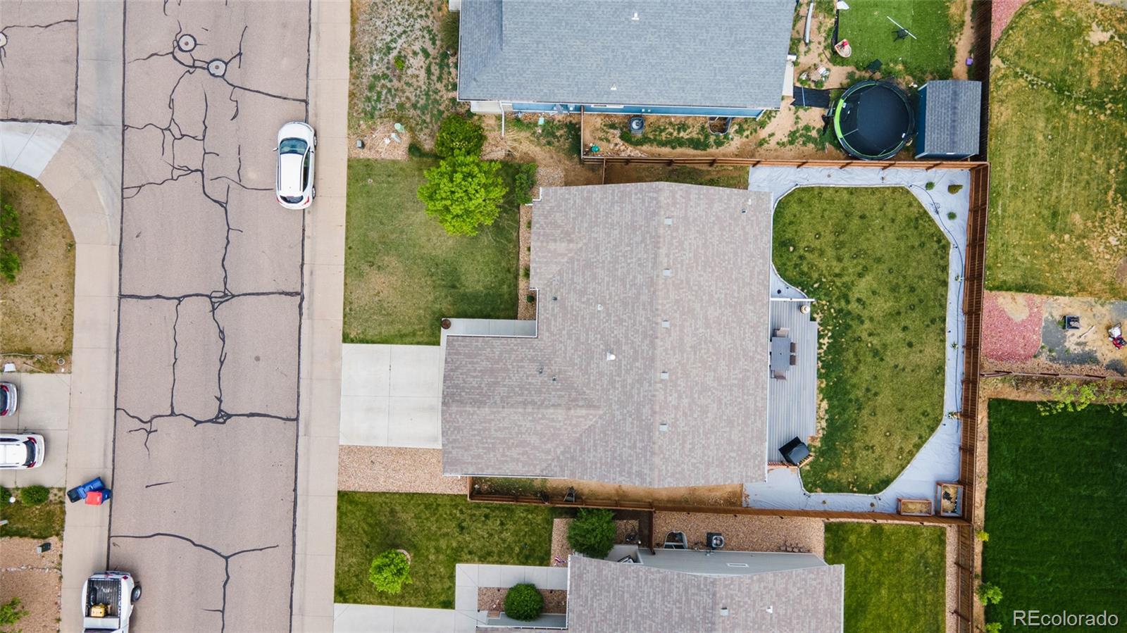 1030 Wagon Train Drive Milliken, CO 80543 - Photo 46 of 49 an aerial view of a house with a yard