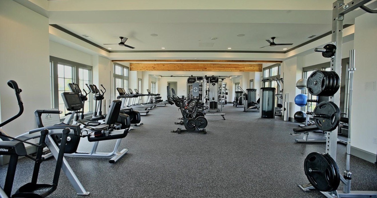 30903 Brightwell Bend Fulshear, TX 77441 - Photo 42 of 44 a view of a room with gym equipment
