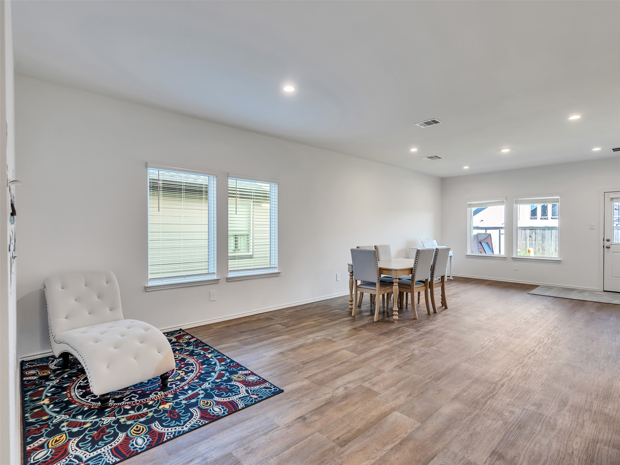 30903 Brightwell Bend Fulshear, TX 77441 - Photo 5 of 44 a living room with furniture and a window