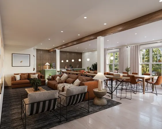 a living room with lots of furniture and a large window