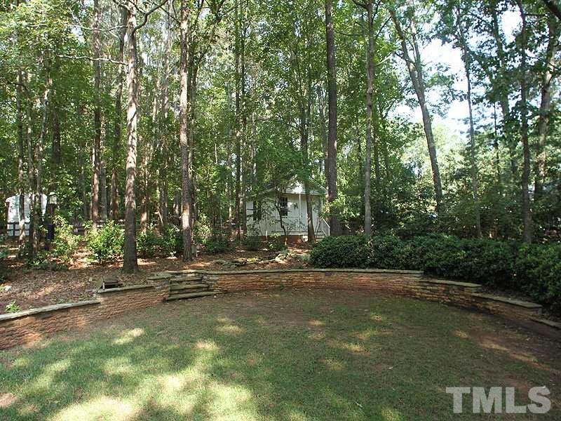9905 Waterview Road Raleigh, NC 27615 - Photo 19 of 21 a view of swimming pool with a yard