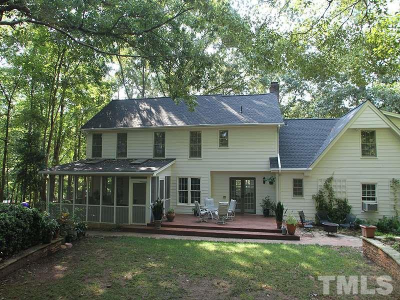 9905 Waterview Road Raleigh, NC 27615 - Photo 21 of 21 a front view of a house with a yard table and chairs
