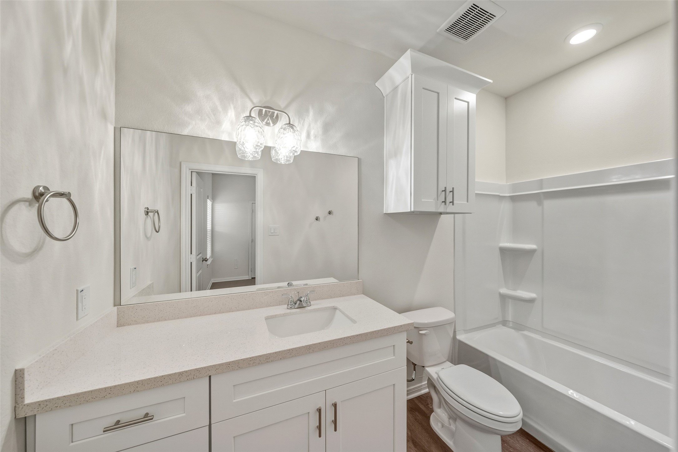 714 West Dallas Street Conroe, TX 77301 - Photo 14 of 19 a bathroom with a sink a toilet and shower