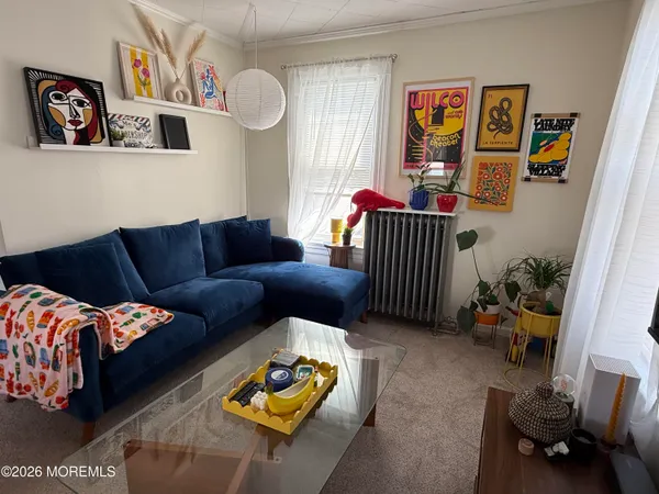 a living room with furniture and a couch