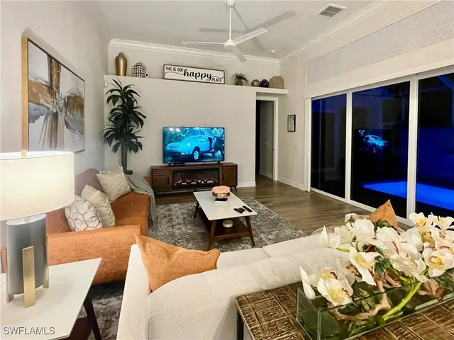 a patio with a table and chairs