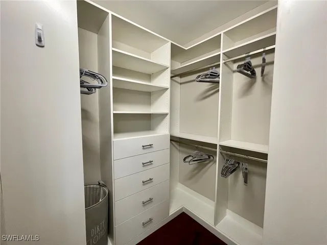 a kitchen with stainless steel appliances granite countertop a refrigerator stove and sink