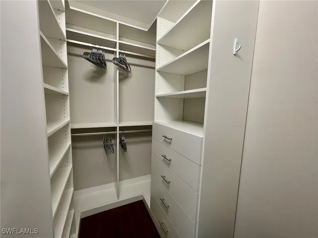 a kitchen with sink cabinets and window
