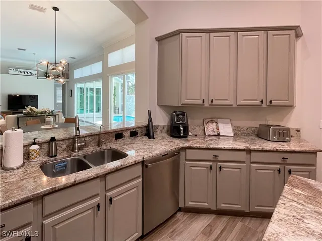 a view of bedroom with wooden floor