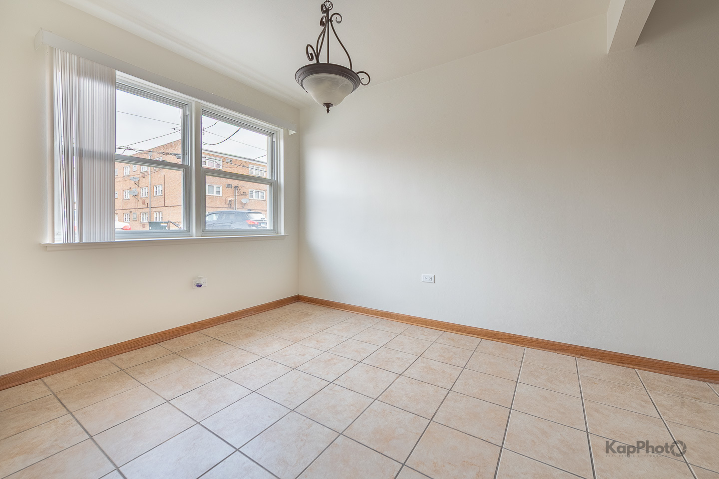 6914 West 65th Street, Unit 7 Chicago, IL 60638 - Photo 12 of 28 a view of an empty room with a window