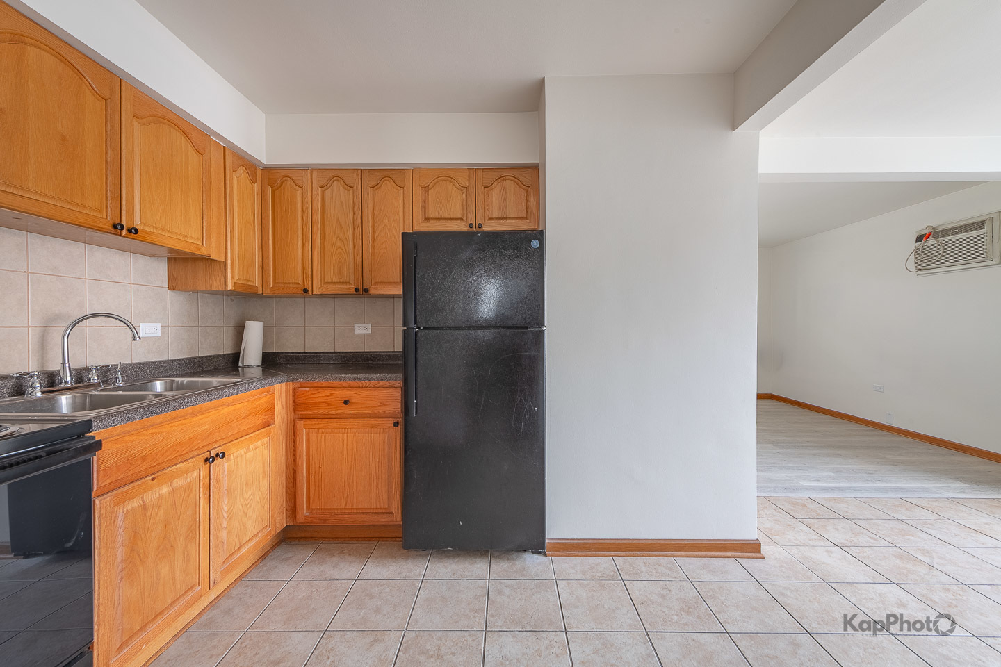 6914 West 65th Street, Unit 7 Chicago, IL 60638 - Photo 15 of 28 a kitchen with stainless steel appliances granite countertop a refrigerator and a sink