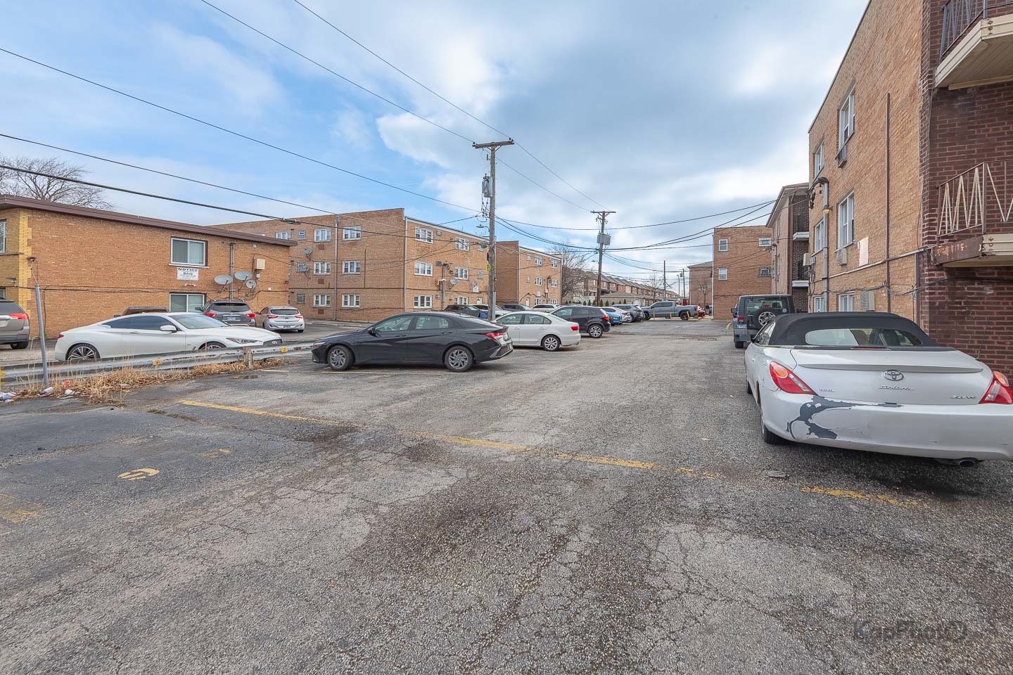 6914 West 65th Street, Unit 7 Chicago, IL 60638 - Photo 27 of 28 a view of a cars parked in a parking lot