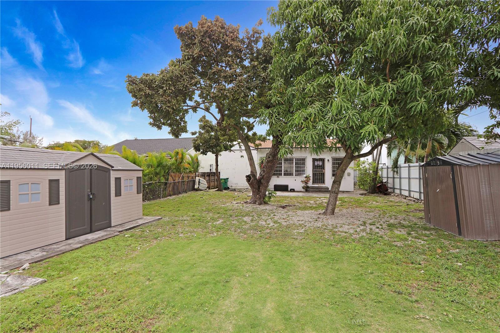 1345 Southwest 17th Street Miami, FL 33145 - Photo 8 of 21 a view of a house with a yard and tree