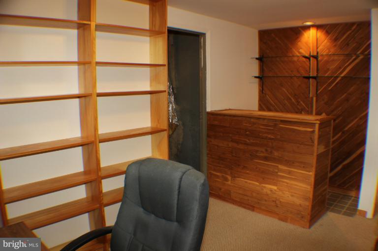 8023 Rocky Run Road Gainesville, VA 20155 - Photo 16 of 30 Lower Level Den with Bar area