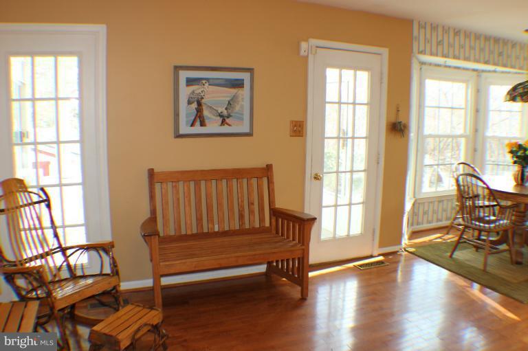 8023 Rocky Run Road Gainesville, VA 20155 - Photo 19 of 30 Family Room with door to Sunporch