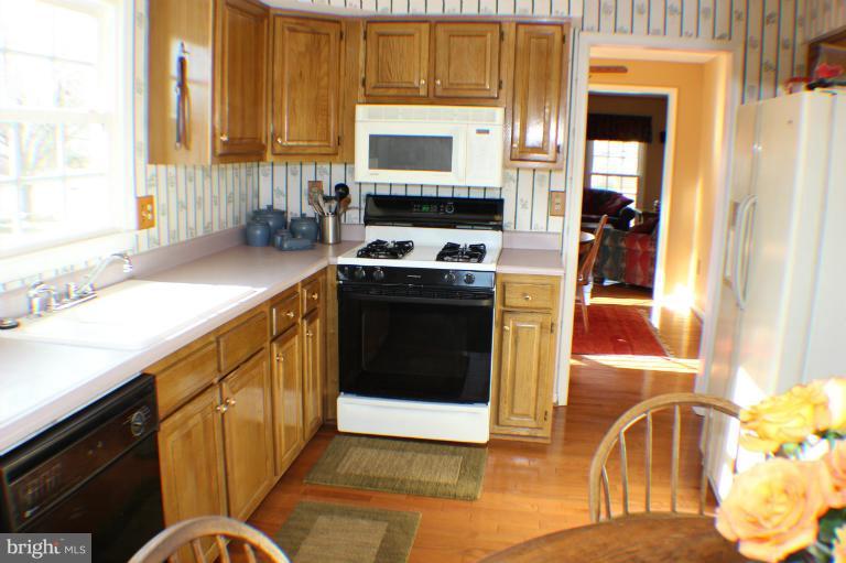 8023 Rocky Run Road Gainesville, VA 20155 - Photo 7 of 30 Kitchen with Wood Floors