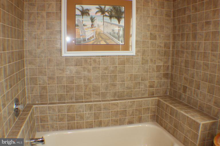 8023 Rocky Run Road Gainesville, VA 20155 - Photo 9 of 30 Tiled walls surrounding Master Tub