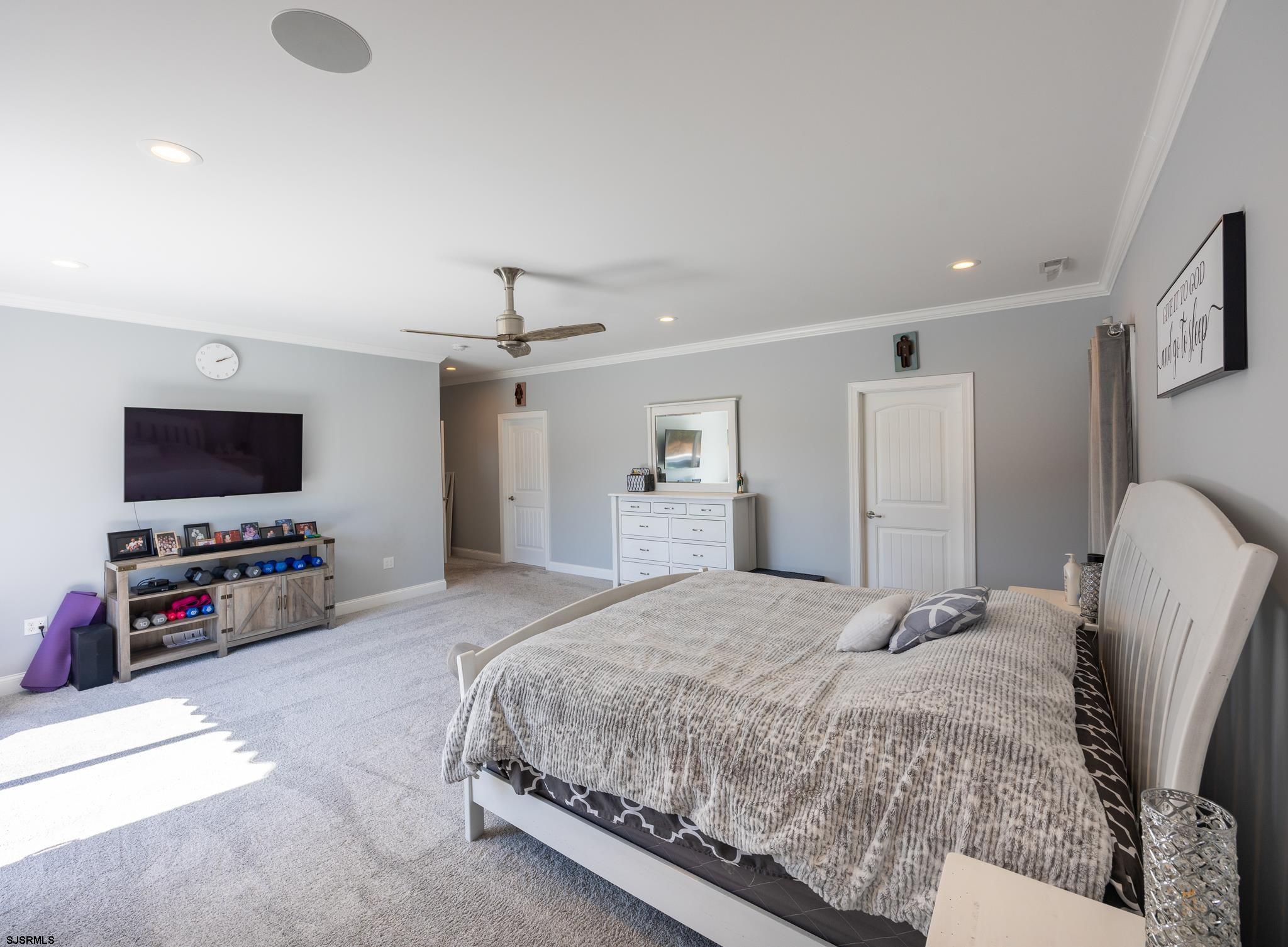 1309 Tyler Road Woodbine, NJ 08270 - Photo 54 of 84 a bedroom with a bed and a flat screen tv
