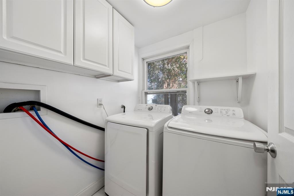 20 Columbus Avenue, Unit 2 Closter, NJ 07624 - Photo 13 of 15 a utility room with dryer and washer