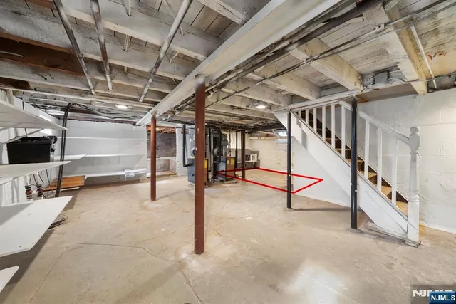 a view of an empty room with windows