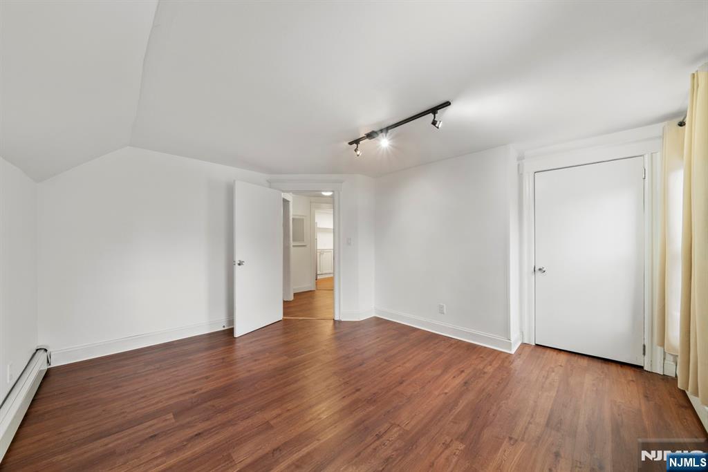 20 Columbus Avenue, Unit 2 Closter, NJ 07624 - Photo 9 of 15 a view of an empty room with wooden floor