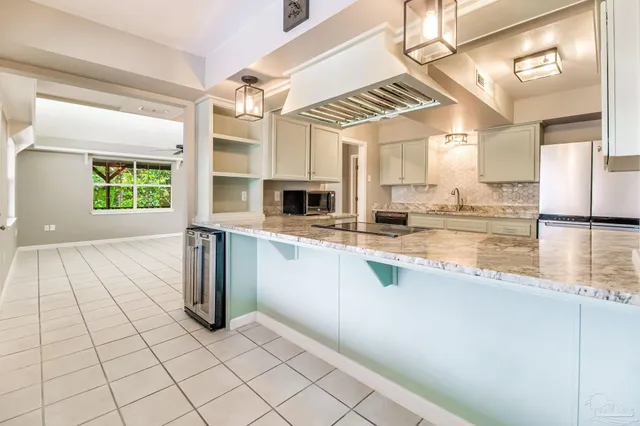 a spacious bathroom with a double vanity sink mirror and
