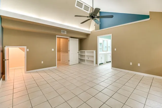 a view of a yard with a tree