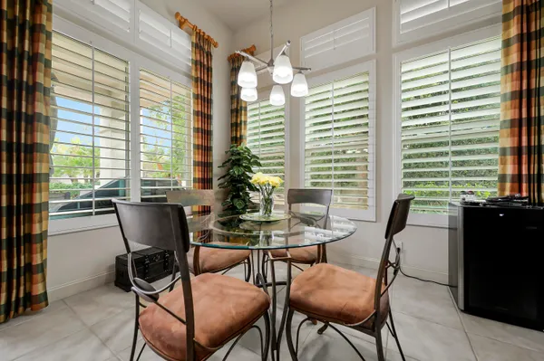 a kitchen with stainless steel appliances a stove refrigerator sink and microwave