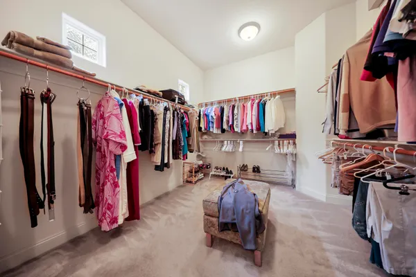 a bed room with a bed and a television