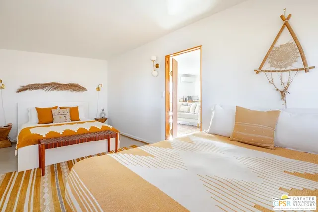 a kitchen with a stove a sink and a refrigerator