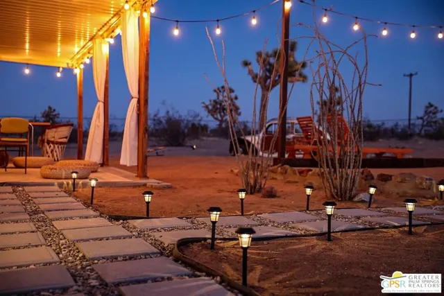 a bathroom with a sink a mirror and vanity