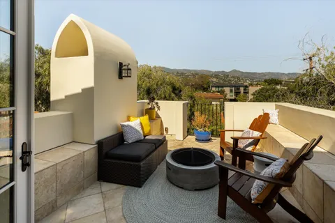 a view of a swimming pool with lounge chair
