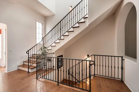 a view of entryway with wooden floor