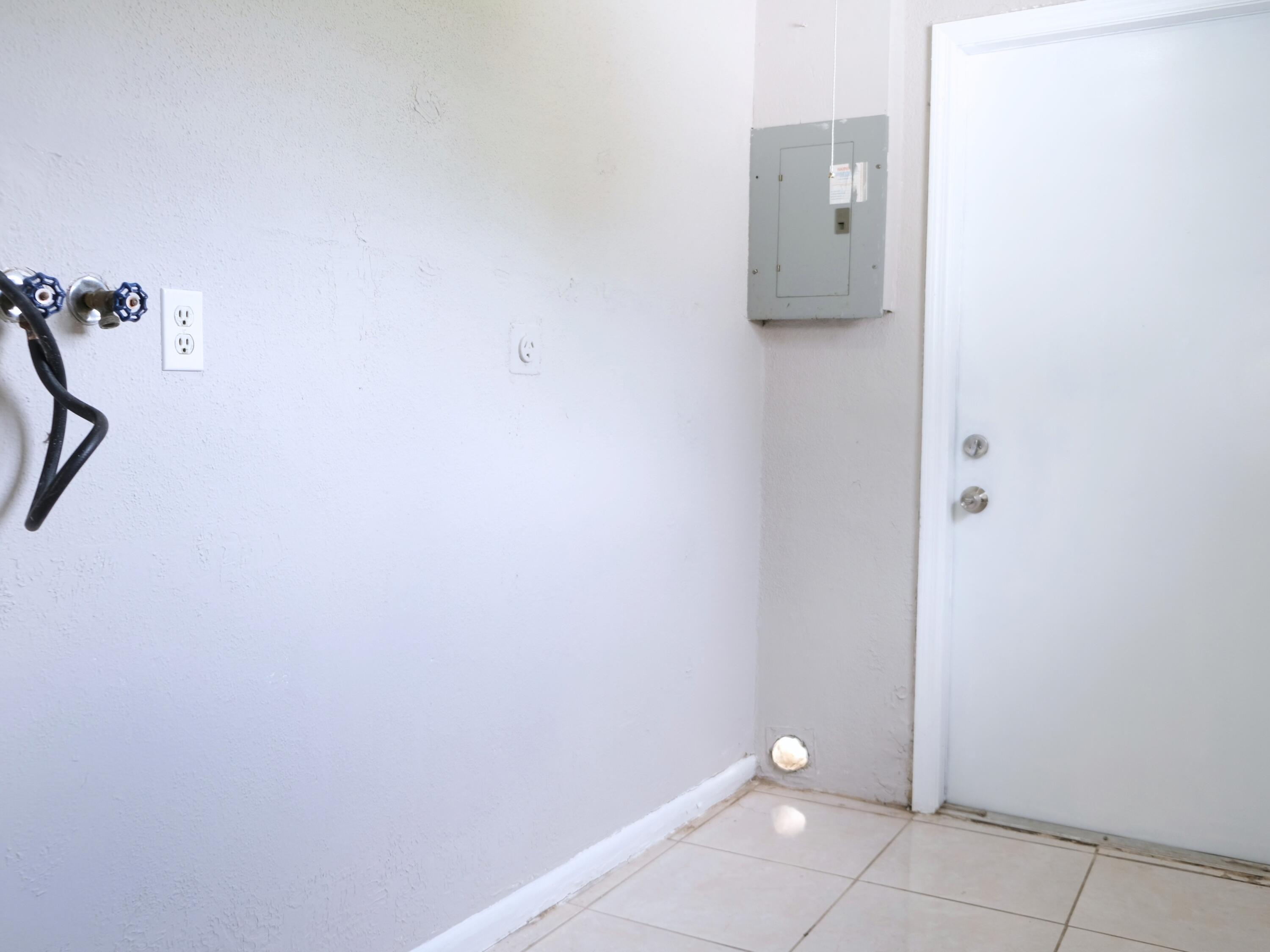 401 Silver Beach Road, Unit A Riviera Beach, FL 33403 - Photo 8 of 13 Laundry Room