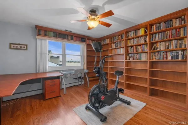 a room with furniture and wooden floor